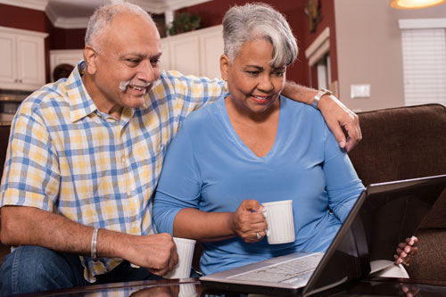 Couple reviewing medical document.