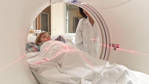 A child being prepared for a CT scan.