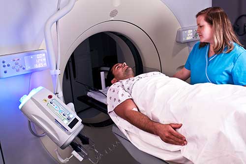 Patient undergoing computed tomography (CT) scan.