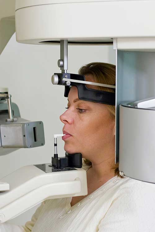 Patient undergoing facial x-ray.